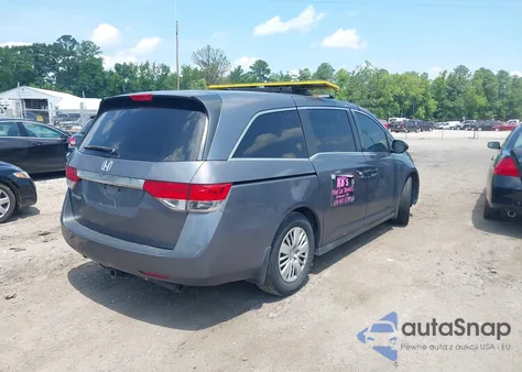 2014 Honda Odyssey Lx z USA, uszkodzony, nr VIN 5FNRL5H2XEB106627